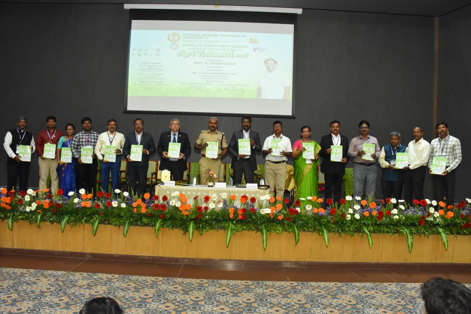 Speaker addressing attendees at a university event