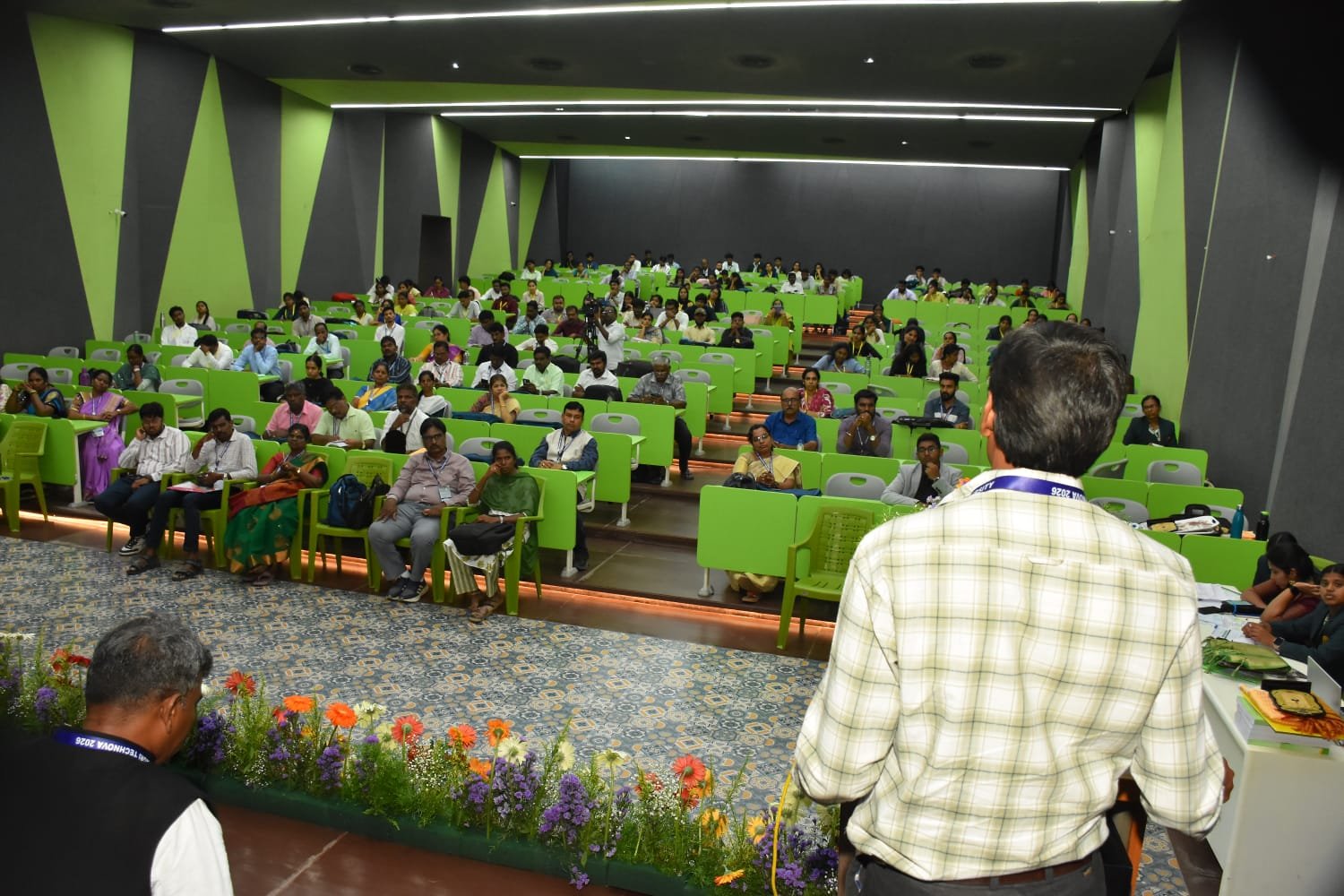 Participants in a discussion around a conference table